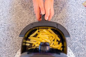 Pode abrir a airfryer em funcionamento?